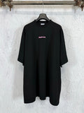 Black short-sleeve T-shirt with small pink Balenciaga logo on the chest