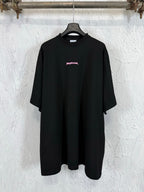 Black short-sleeve T-shirt with small pink Balenciaga logo on the chest