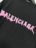 Black T-shirt back logo detail in pink lettering