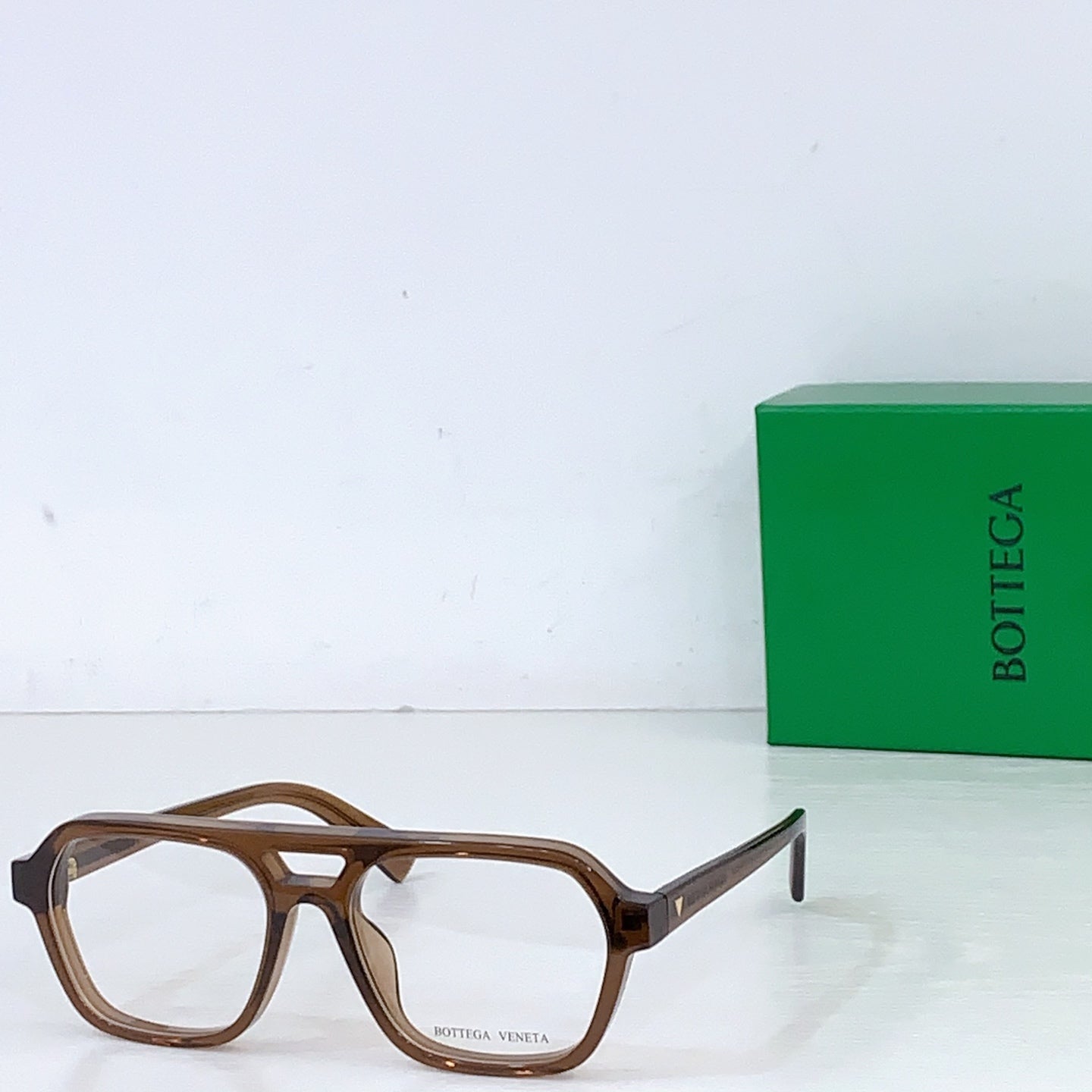 Bottega Veneta sunglasses with tortoise frame and clear lenses