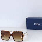 Dior sunglasses with tortoiseshell oversized square frames and amber gradient lenses