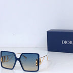 Dior sunglasses with blue oversized square frames and blue gradient lenses