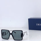 Dior sunglasses with black oversized square frames and cool gray gradient lenses
