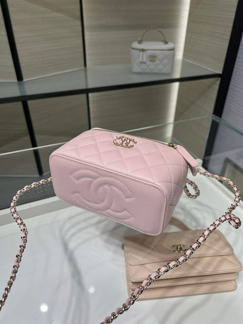 Chanel small quilted crossbody bag in light pink with chain strap