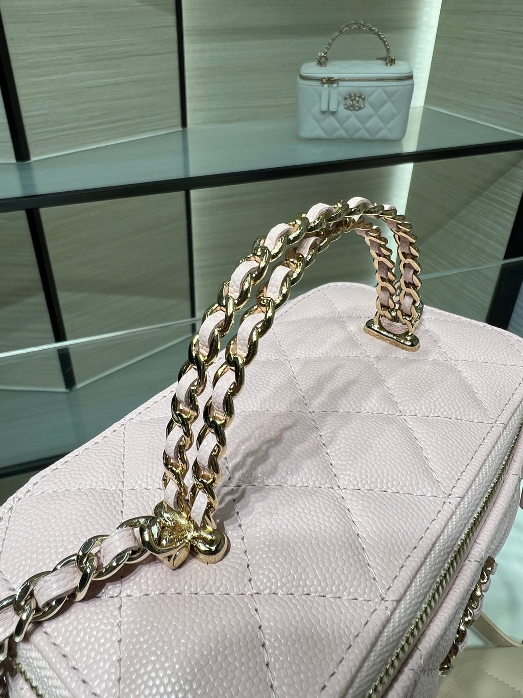 Chanel quilted bag in white with gold chain shoulder strap and top handle