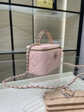 Chanel quilted mini bag in light pink with chain strap and top zipper
