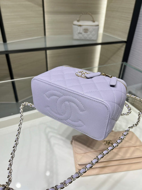 Chanel quilted shoulder bag in lavender with logo emblem and chain strap, front view