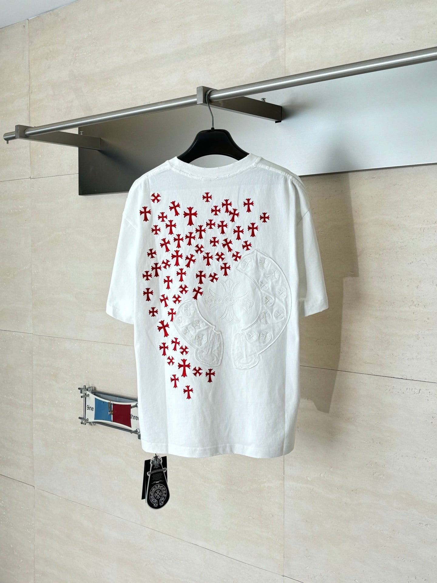 White short-sleeve T-shirt with large back red and blue logo graphic