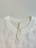 White T-shirt neckline with inner neck label and stitched collar seam