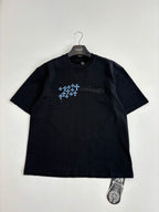 Black short-sleeve T-shirt with blue snowflake logo on front