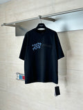 Black short-sleeve T-shirt with blue geometric snowflake logo on chest