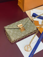 Gray-green monogram mini handbag with gold chain, front flap and gold lock hardware