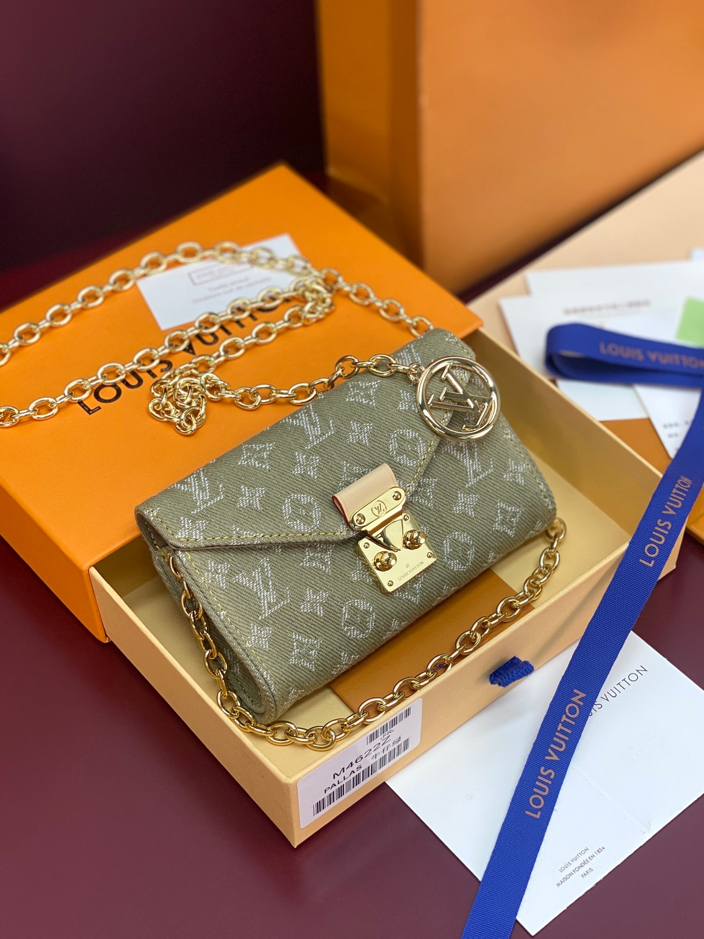 Monogram mini handbag, gray-green canvas, gold chain and front flap clasp