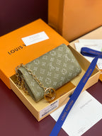 Monogram mini handbag with gold chain strap, gray-green canvas and round clasp charm