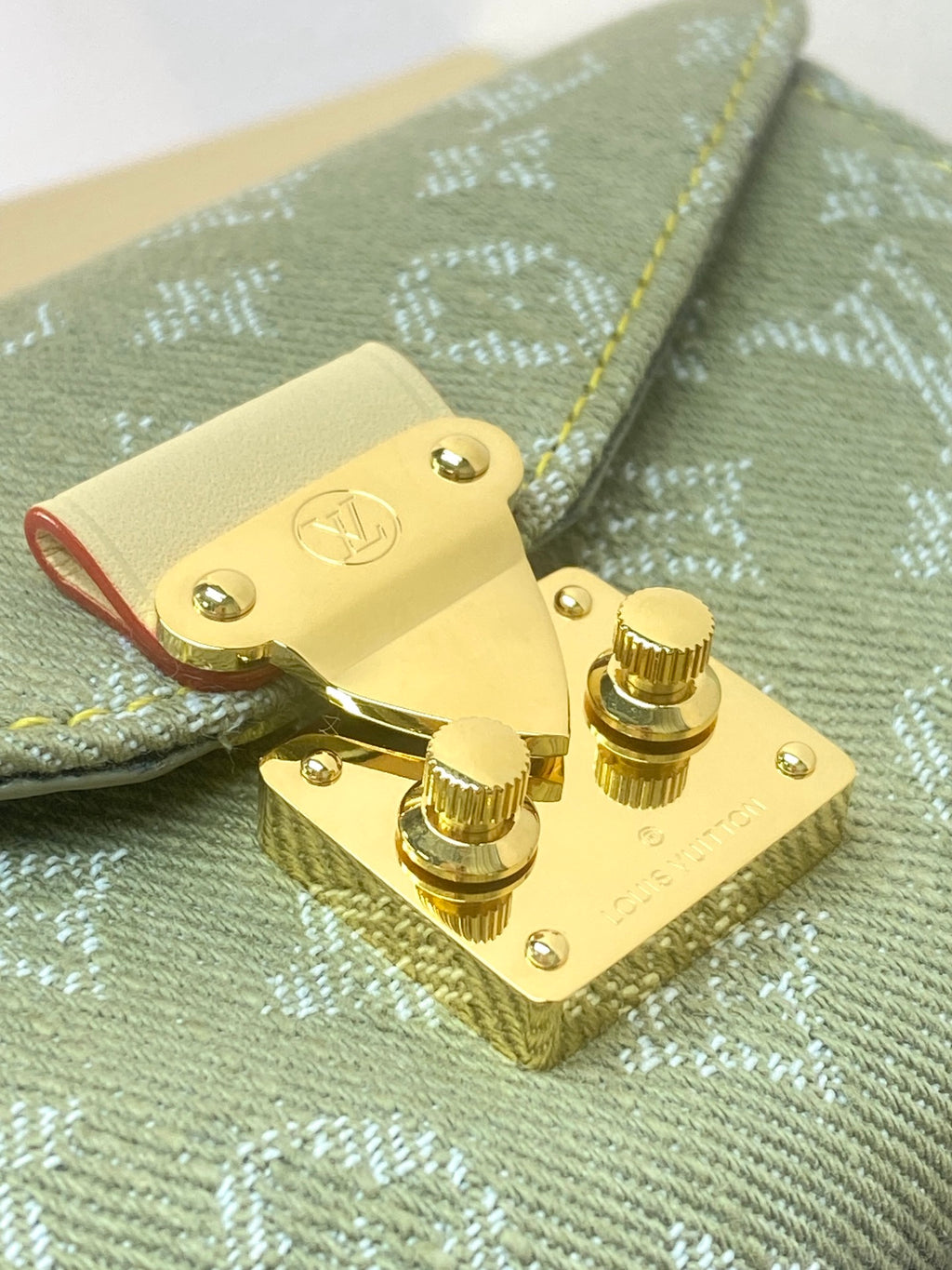 Small handbag, green monogram canvas with gold snap hardware and rings