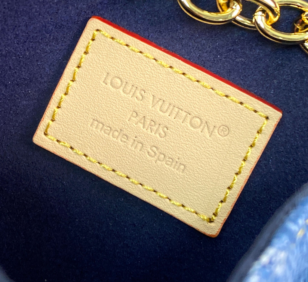 Louis Vuitton small bag leather label with Paris and made in Spain text