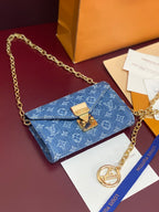 Blue monogram canvas mini crossbody bag with gold chain and LV-style lock