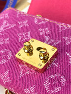 Louis Vuitton bag gold hardware plate on purple monogram fabric