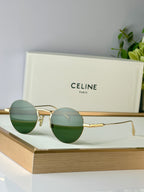 Celine round glasses with gold metal frame and green-tinted lenses