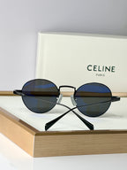 Round sunglasses with black frames and dark lenses, front view