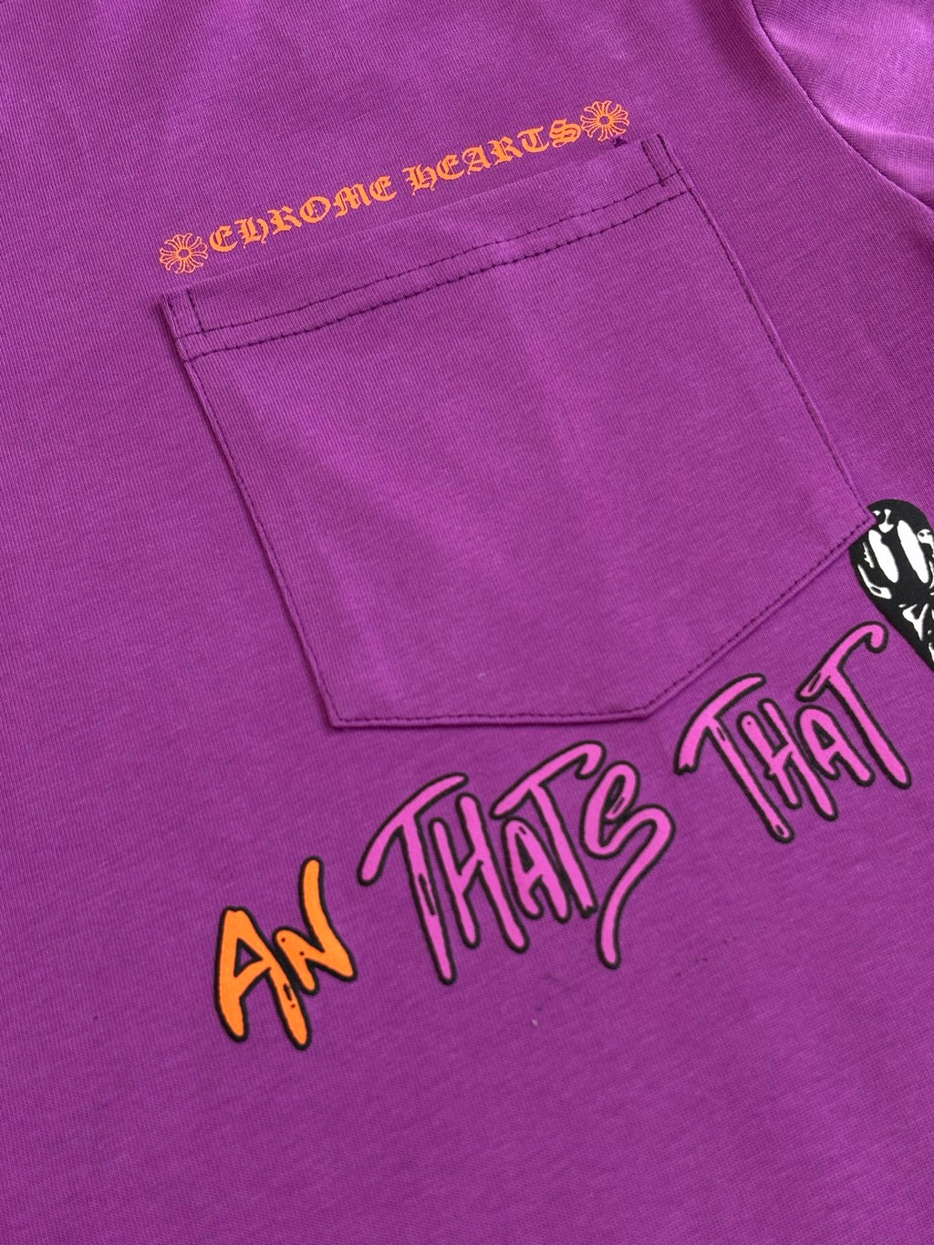 Chrome short-sleeve T-shirt, purple with front pocket seam and graphic lettering