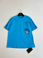 Blue short-sleeve graphic T-shirt with chest pocket graphic and front logo