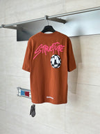Orange short-sleeve T-shirt back with pink StreetLife text and soccer ball graphic