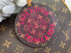 Louis Vuitton monogram stamp patch with magenta text and circular border