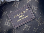Louis Vuitton Paris made in France leather logo patch on dark monogram fabric