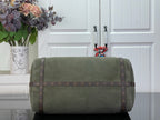 Louis Vuitton bag in olive green with brown monogram top band and shoulder strap