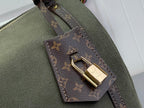 Louis Vuitton bag corner detail: monogram patch with gold lock on olive green fabric