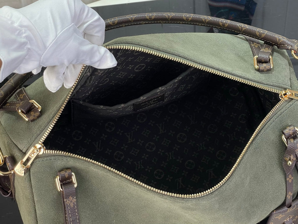 Louis Vuitton hobo bag in olive with gold zip top and monogram-pattern lining
