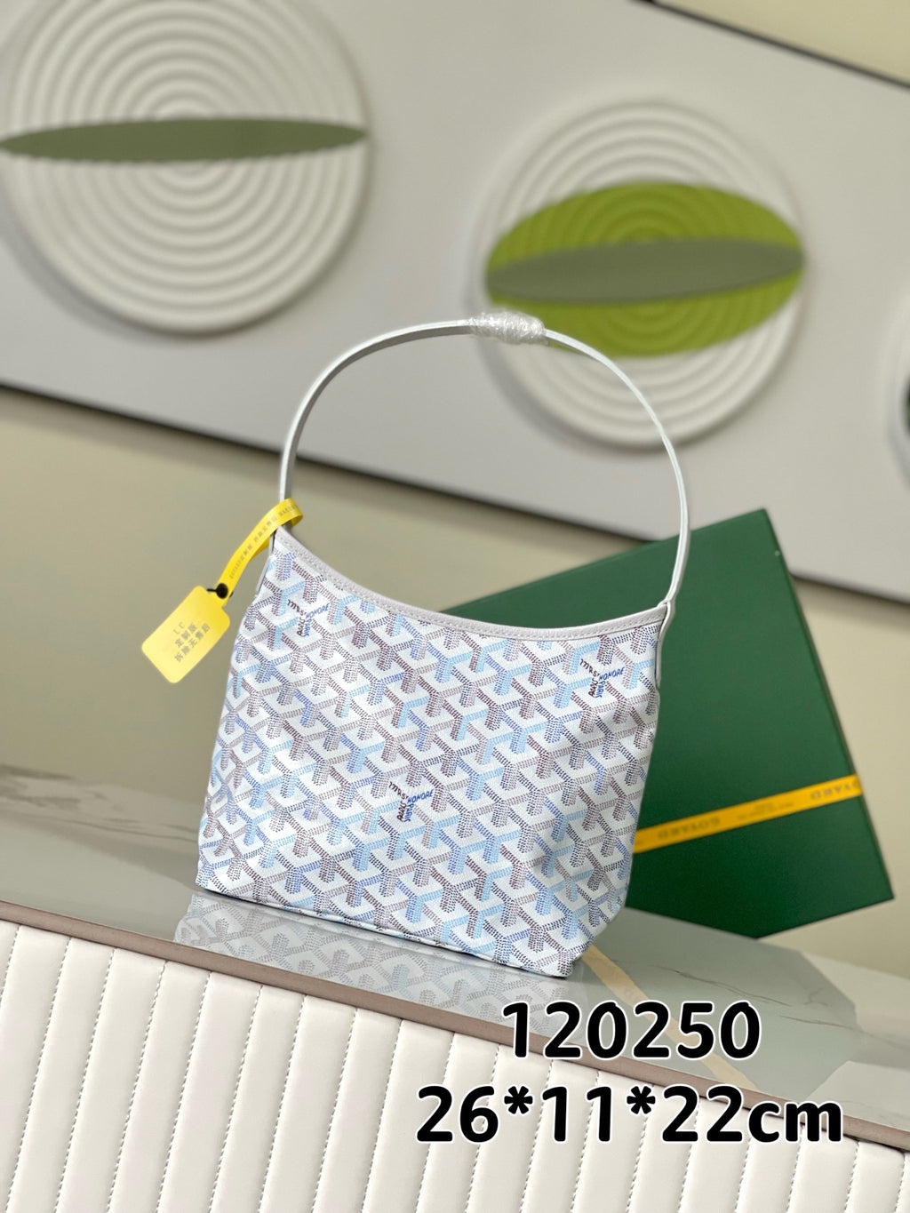 Goyard-style hobo shoulder bag with light blue monogram pattern and top handle