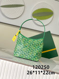 Goyard bag in green with repeating pattern, top handle, and fabric-lined opening.
