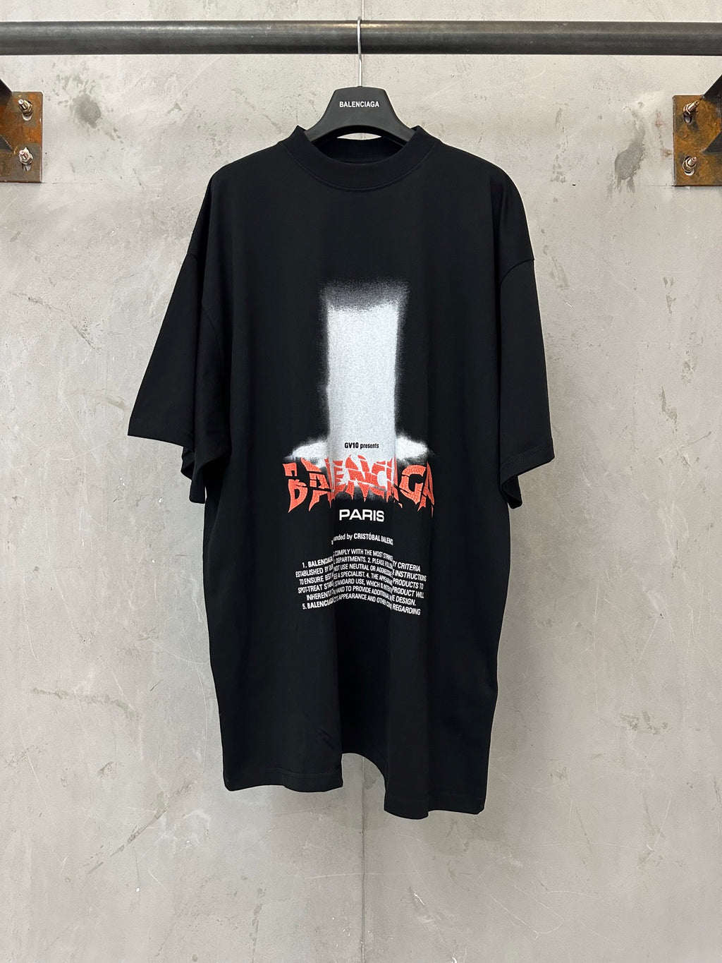 Black short-sleeve T-shirt with Balenciaga graphic print on chest