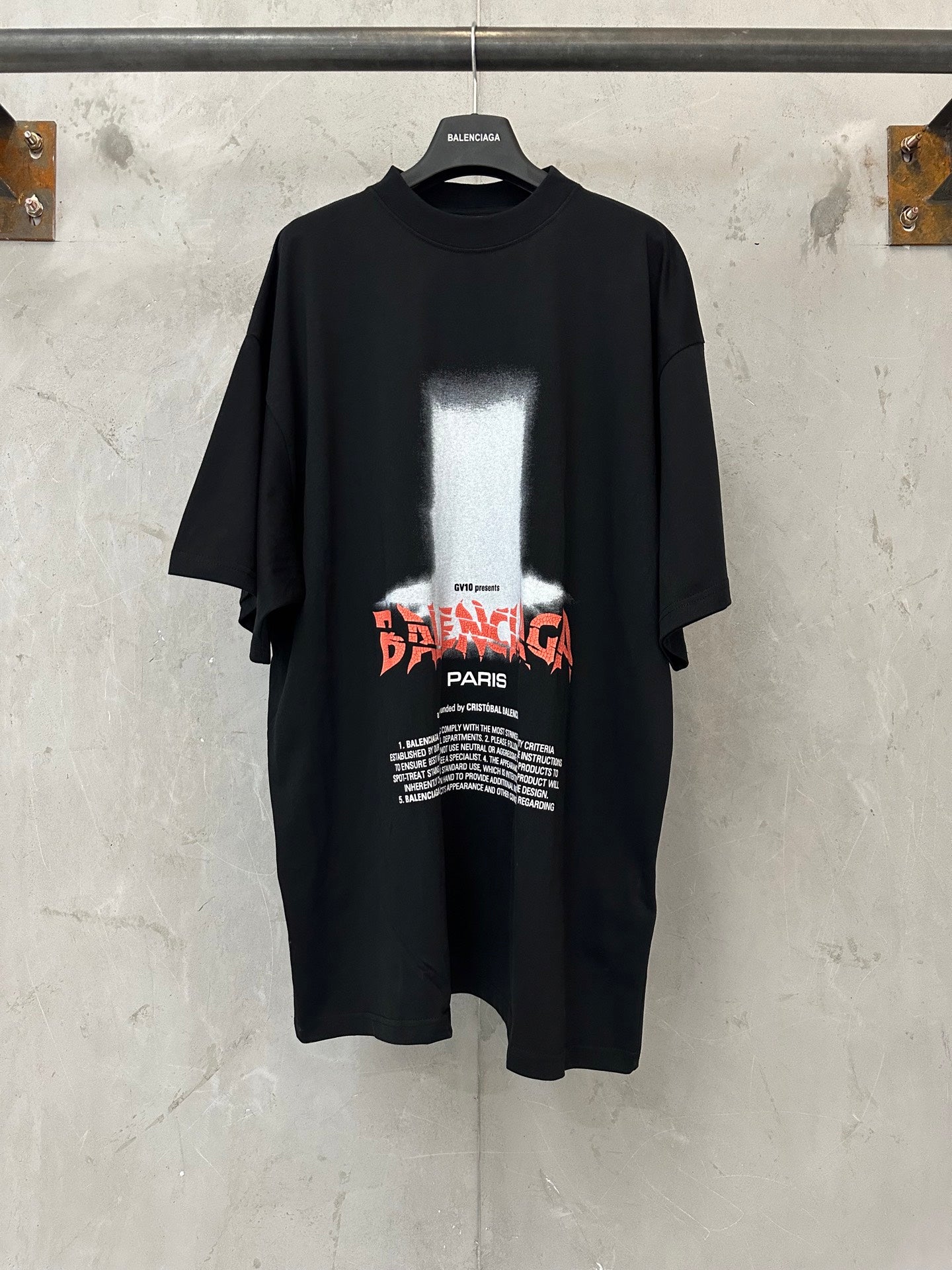 Black short-sleeve T-shirt with Balenciaga graphic print on chest