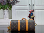 Monogram canvas duffel bag with tan center stripe and end handles