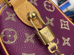 Louis Vuitton monogram bag, purple leather with gold buckle and padlock