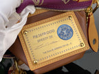 Louis Vuitton Speedy 20 label on brown pocket inside purple monogram bag