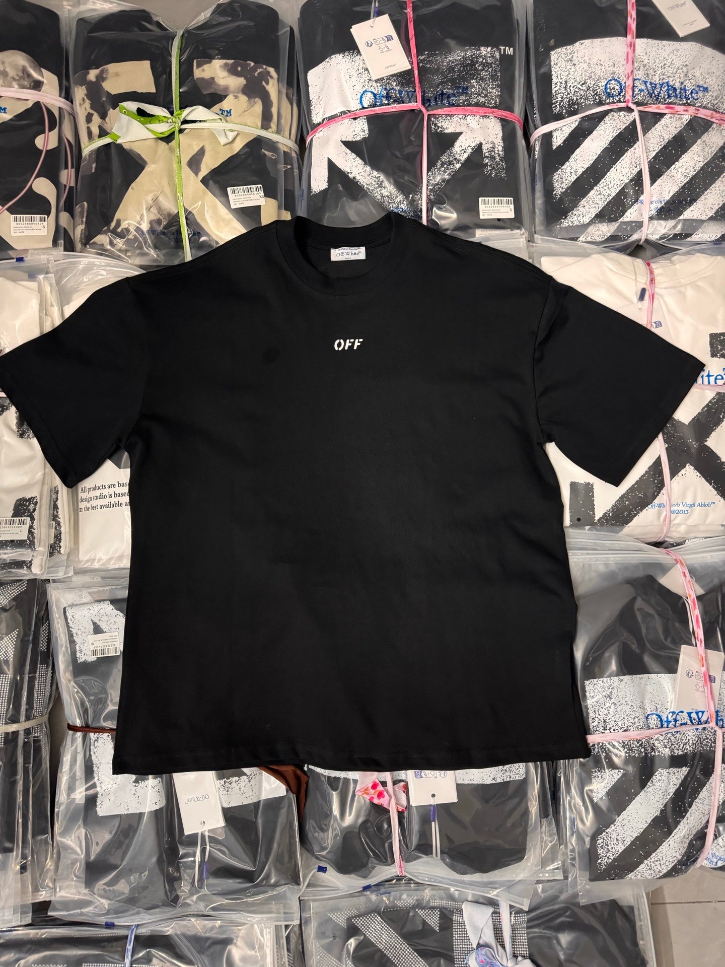 Black short-sleeve T-shirt with small chest logo print