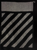Black T-shirt close-up of rhinestone rectangle and diagonal stripe graphic