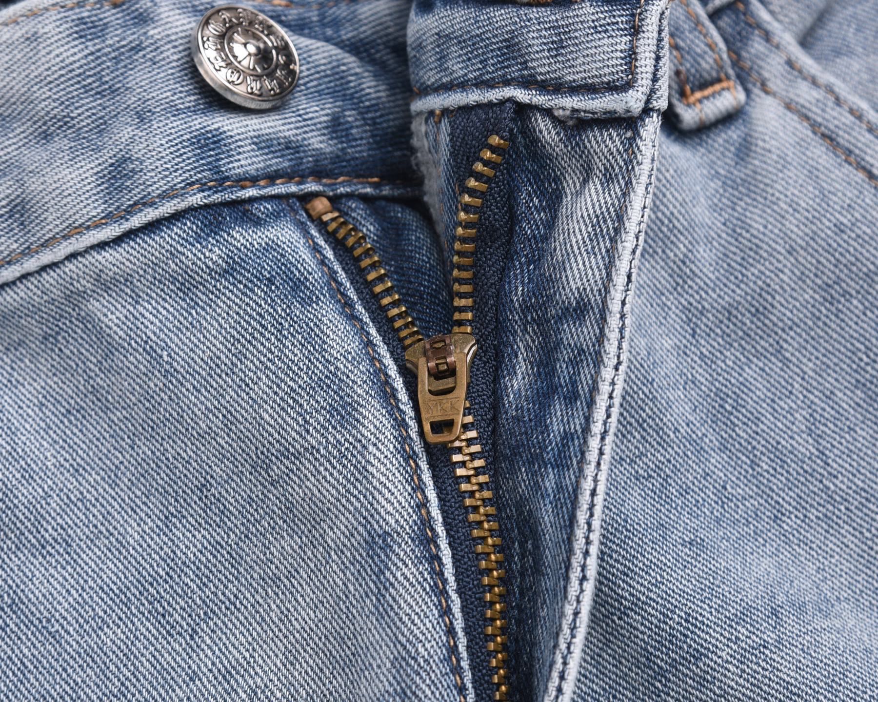 Light-wash denim shorts with metal button, belt loops, and front zipper