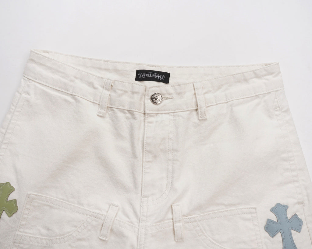 White shorts with logo patch at waistband and multicolor cross details
