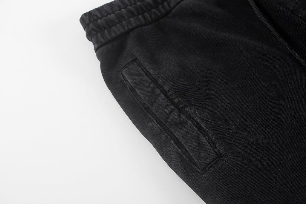 Black shorts waistband and stitched front pocket panel