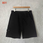 Black shorts with elastic waistband and front welt pocket