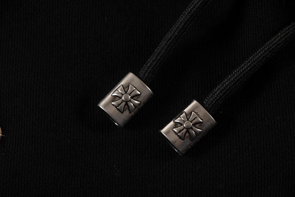 Black fabric drawstring with silver square metal tips