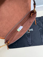 Celine brown leather crossbody bag with long strap and hanging tag