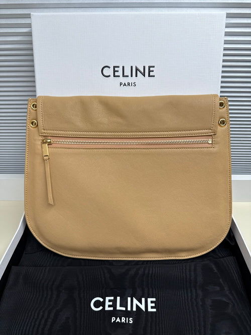 Celine beige leather crossbody bag with top zip pocket and adjustable shoulder strap