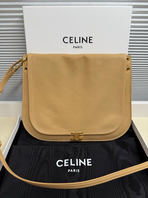 Celine foldover crossbody bag in beige leather with front flap and gold clasp