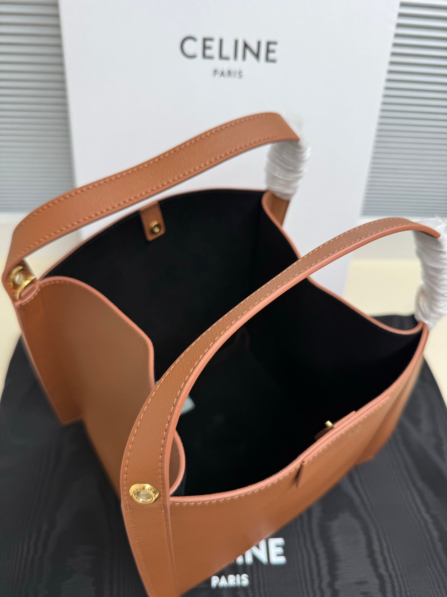 Celine tan leather mini handbag interior view through open top